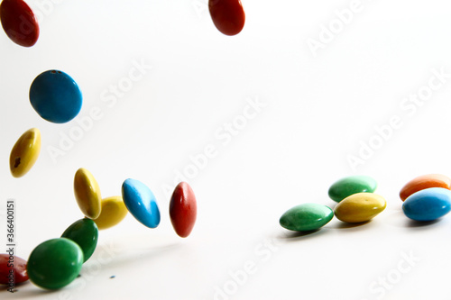 Colorful chocolate candy on white background