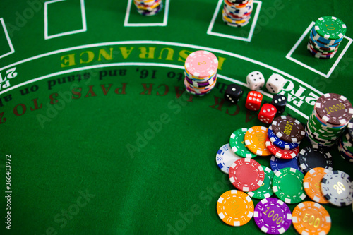 Casino equipment placed on the green floor for risky gambling for the people who want to get rich.