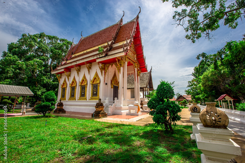 Background of an important tourist attraction in Khon Kaen, where tourists come to see the beauty always (Phra That Kham Kaen) is an old pagoda and has a beautiful golden yellow color, in Thailand