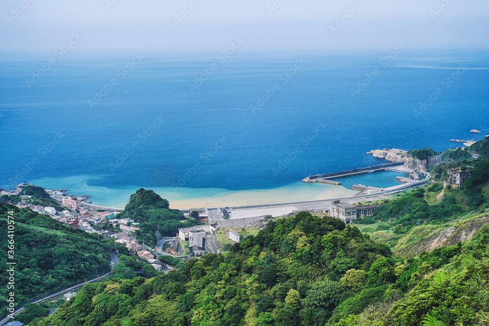Yinyang Sea Coast Landscape with warm sunlight in afternoon, shot from Shuinandong, Ruifang District, New Taipei, Taiwan.
