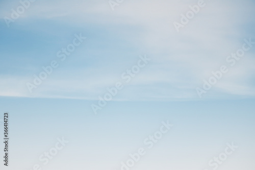 Beautiful sky and clouds in soft color.Soft cloud in the sky background blue tone.