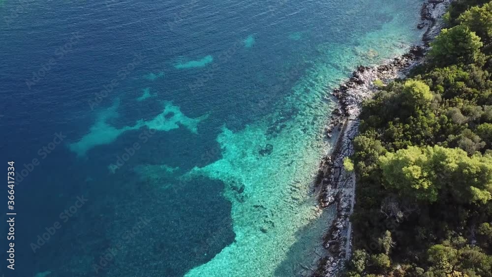 Landscape with coconut trees and turquoise lagoon Landscape with coconut trees and turquoise lagoon