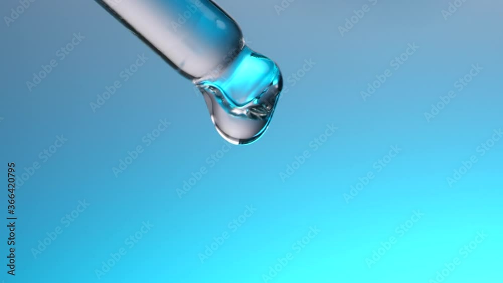 Water dropper in slow motion on blue background