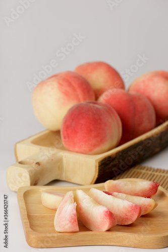 honey peach in wooden bowl