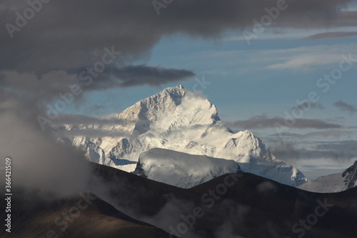 Mount Everest through the clouds photo