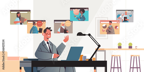 businessman chatting with mix race colleagues during video call business people having online conference meeting communication concept office interior horizontal portrait vector illustration