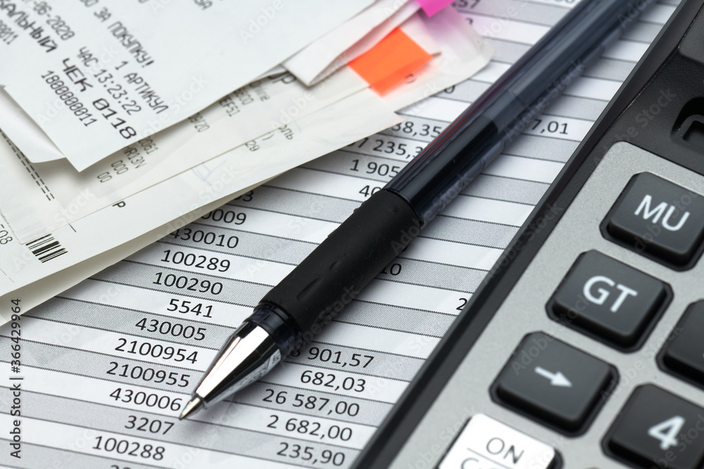 cash registers purchase receipt written on russian language, calculator and financial reports, analysis and accounting, various office items for bookkeeping cash registers purchase receipt written on russian language, calculator and financial reports, analysis and accounting, various office items for bookkeeping