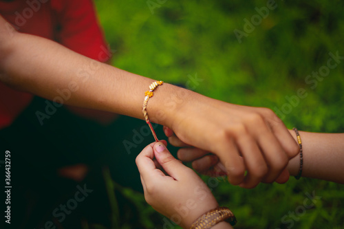 Принти на полотні brother and sister hands  celebrating raksha bandhan festival