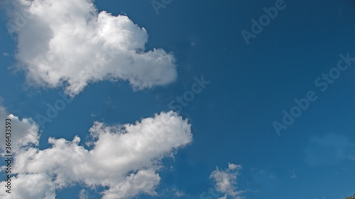 Atmospheric sky art image. White Cumulus cloud in blue sky. Australia.