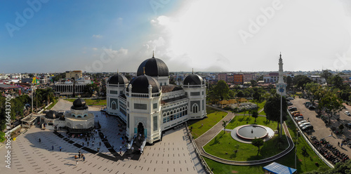 Vászonkép Masjid Besar Medan (Masjid Raya Al Mashun) Medan, Indonesia with blue sky and la