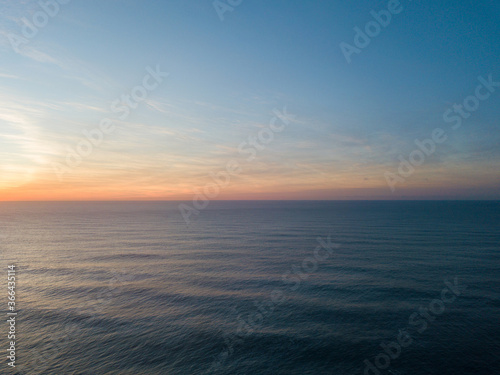 Sunrise view over the ocean horizon.