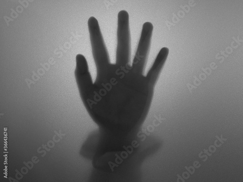 Photography Woman hands behind glass in black and white