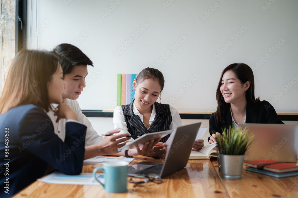 Fund managers team consultation and discuss about analysis Investment stock market by digital tablet. Fund managers team consultation and discuss about analysis Investment stock market by digital tablet.