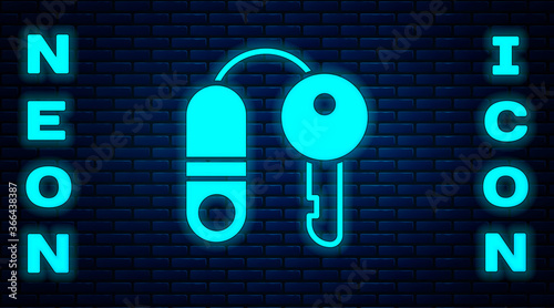 Glowing neon House with key icon isolated on brick wall background. The concept of the house turnkey. Vector Illustration.