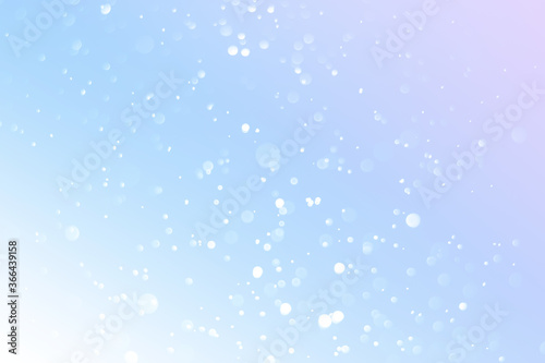 Bokeh of water drops reflects light on soft color background. Beautiful abstract pastel background.
