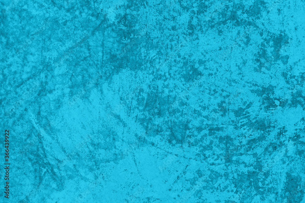 Mint blue saturated low contrast Concrete textured background with roughness and irregularities. 2021 color trend.