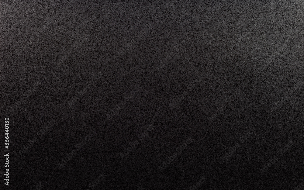 Fototapeta premium Closeup of black, rough background lit with dim light.