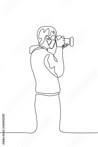 Silhouette of a male photographer / journalist / private detective with a professional camera who takes or takes a photo. Vector illustration can be used for animation