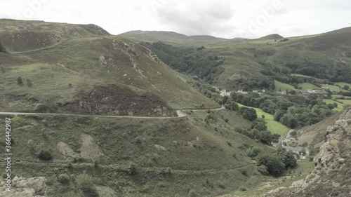 Capelulo Penmaenmawr Welsh mountain coastal valley aerial view north wales dolly left lowering photo