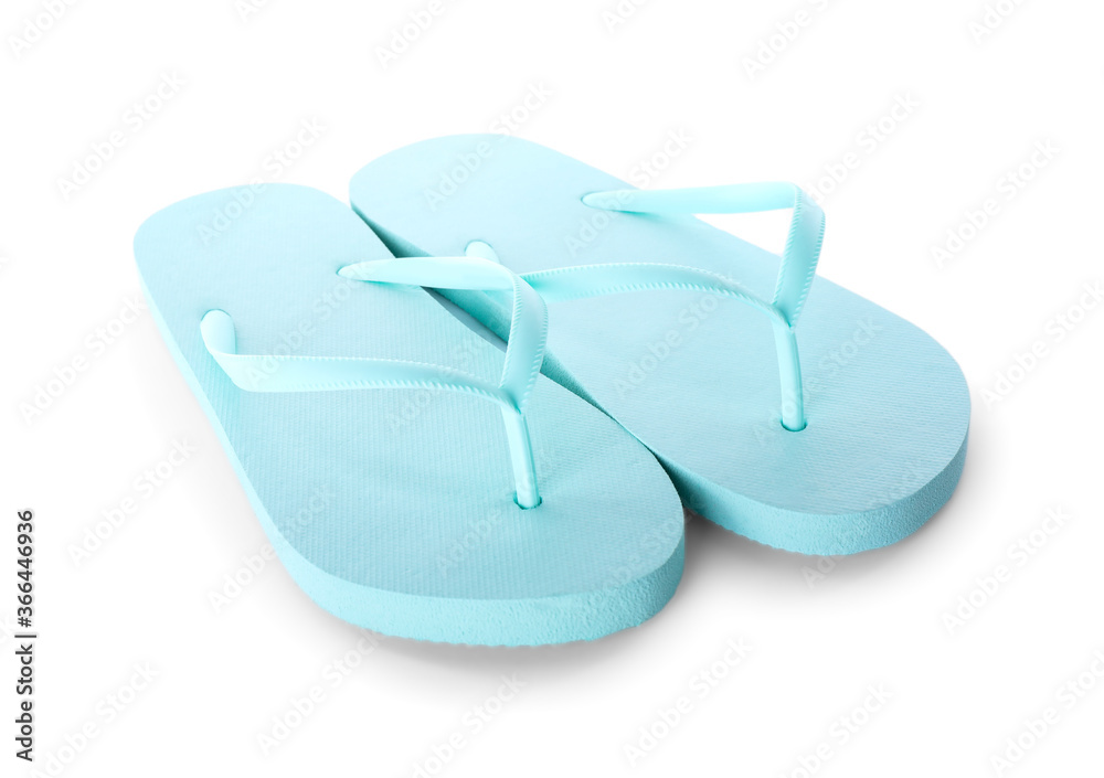 Light blue flip flops isolated on white. Beach accessory Light blue flip flops isolated on white. Beach accessory