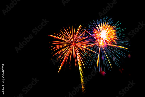 celebration happy new year and merry christmas firework isolated on black isolated background