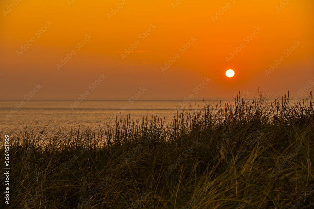 Sunset on the beaches of Huisduinen, Netherlands.