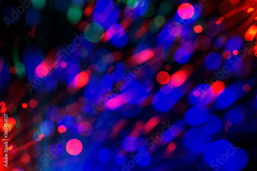 Red blue bokeh effect background. Light splash as salute and fireworks. Bright background on black.
