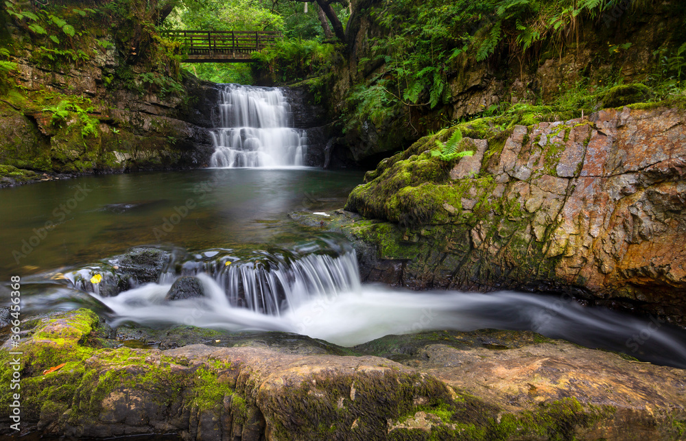 Fototapeta premium The Sychryd Cascades, (Sgydau Sychryd in Welsh) a set of waterfalls in the area called waterfall country near the Dinas Rock, Pontneddfechan, South Wales, UK
