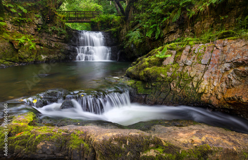 Fototapeta Naklejka Na Ścianę i Meble -  The Sychryd Cascades, (Sgydau Sychryd in Welsh) a set of waterfalls in the area called waterfall country near the Dinas Rock, Pontneddfechan, South Wales, UK