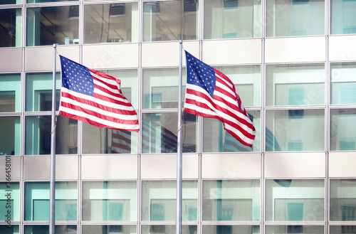 Two American Flags in front of an office building, New York.