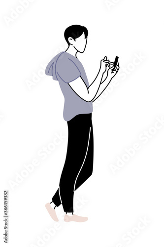 young man with cell phone in hand