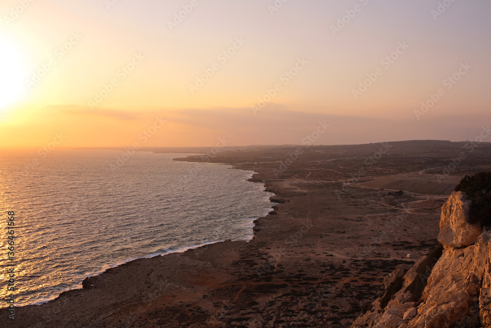 View from Cape Cavo Greco (Capo Greco) to the sunset, the sea and the coast to the horizon . Cyprus.