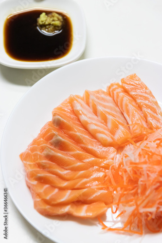 Fresh salmon sashimi serve on plate. Japanese food style. 