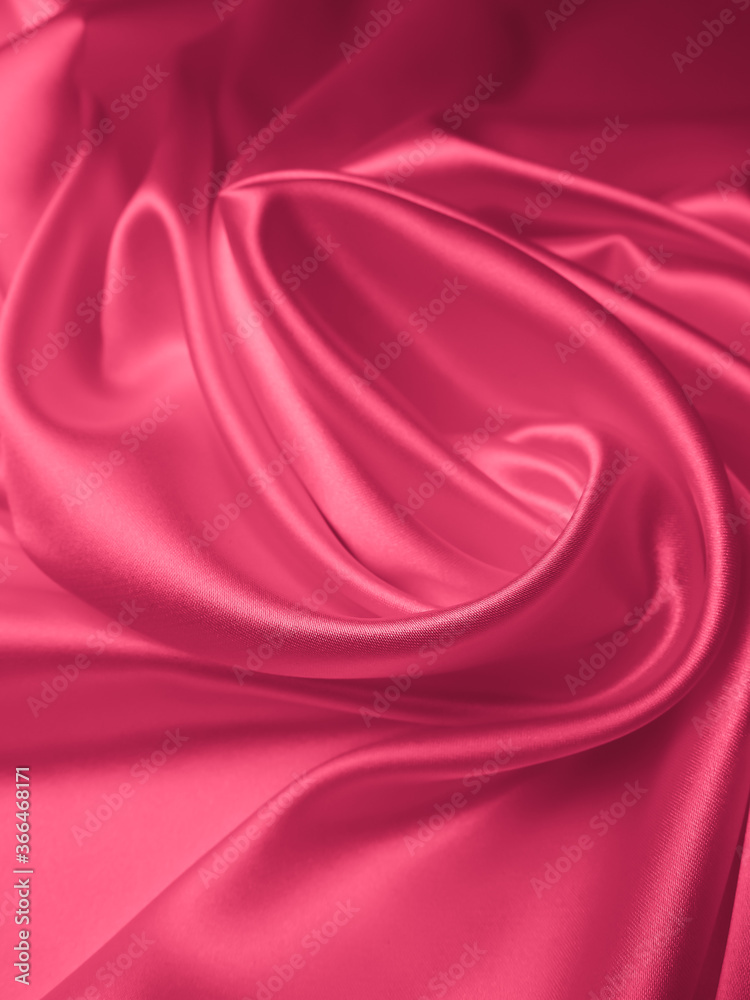 Obraz premium Beautiful elegant wavy light pink satin silk luxury cloth fabric texture, abstract background design. Copy space