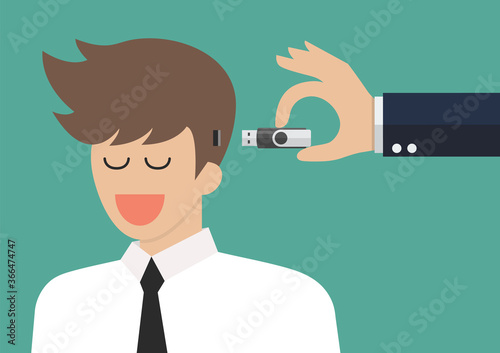 Hand holding usb flash drive to connect other businessman head