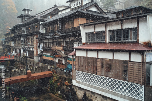 Yamagata, Japan - Nov 16, 2017: Ginzan Onsen first snow of Japanese famous hot spring town in Obanazawa City, Yamagata, Japan.