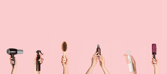 Collage with female hands holding different hair care products and equipment over pink background, copy space