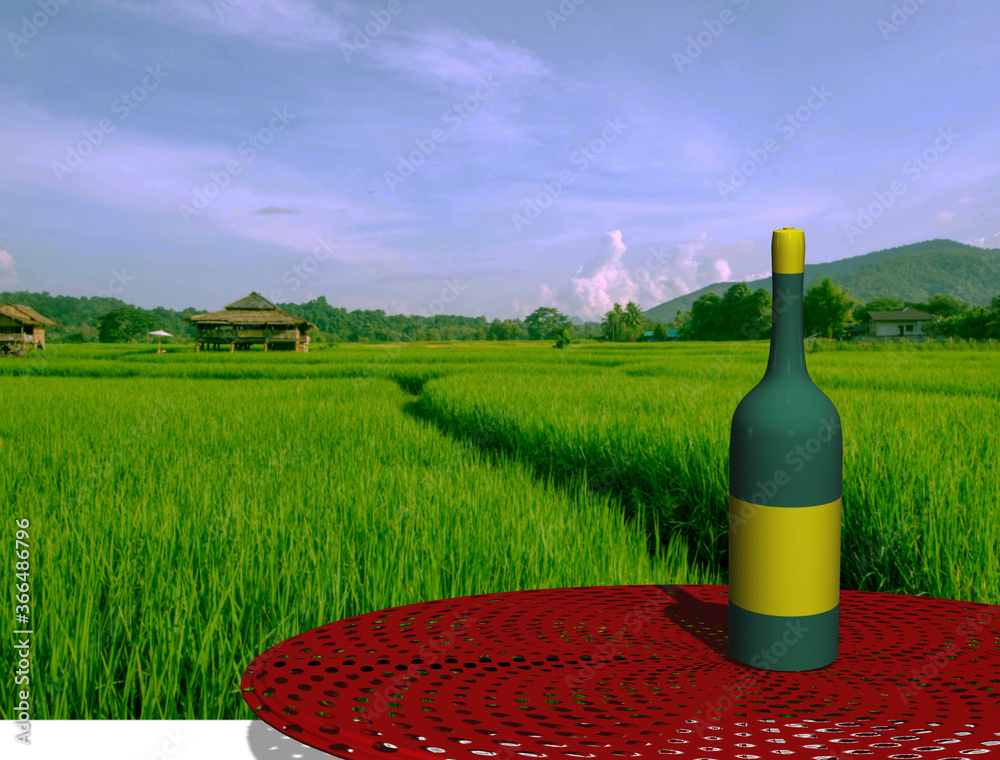 Green wine bottle on red table with green rice field background
