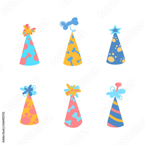Festive party caps for your dogs birthday. Set of vector illustrations with caps for puppies. Bones, stripes, paws, buboes. Cute hats for animals. Isolated on a white background © Анна Канищева