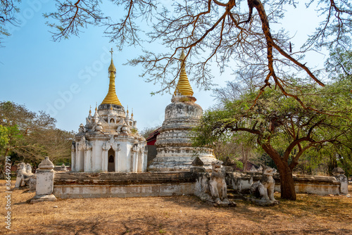 Buddhist white and golden temple in Old Bagan, Burma Myanmar © Delphotostock
