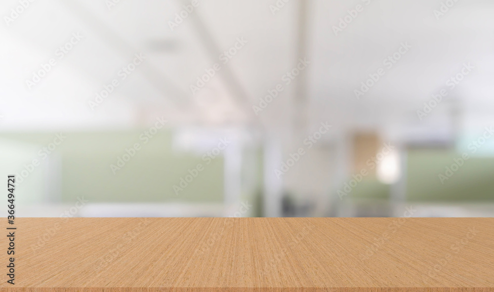 abstract blur inside office with modern wood table perspective for show ads or promote product and content on display concept
