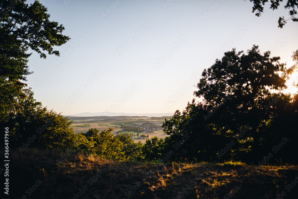 view of the taunus at sunset from the celtic plateau on the glauberg