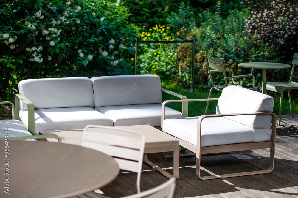 Terrace with modern furniture in the garden 