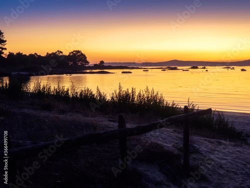 Fototapeta Naklejka Na Ścianę i Meble -  Golden twilight in Arousa Island