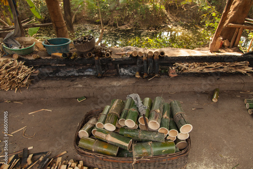 Vászonkép Traditional sticky rice cooked in bamboo as street food as found in Cambodia