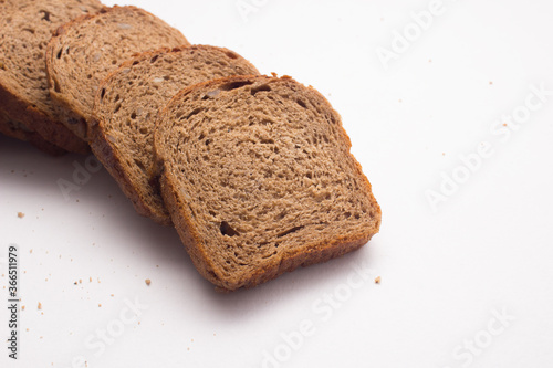 Assortment of baked bread on white background
