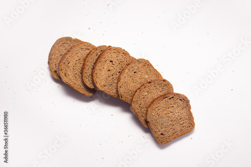 Assortment of baked bread on white background