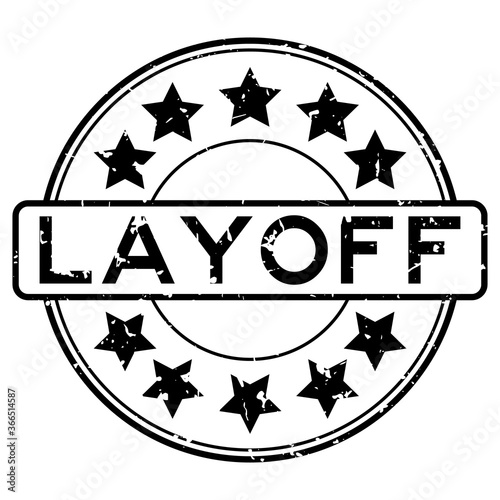 Grunge black layoff word with star icon round rubber seal stamp on white background