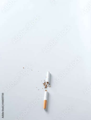 teared cigarette on white background concept for no smoking or quit smoking.