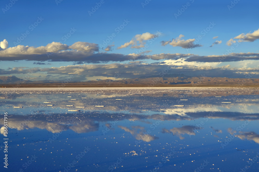 Obraz premium The Mirror Effect of Salar de Uyuni or Uyuni Salts Flats at the End of Rainy Season, Bolivia, South America